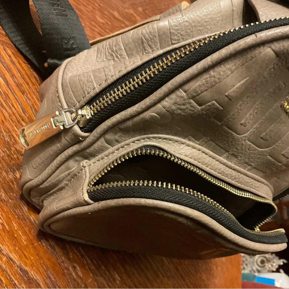 Steve Madden Cute Stylish Durable Mini Backpack Fringe Bag!